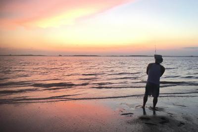 fishing tybee island beach sunset