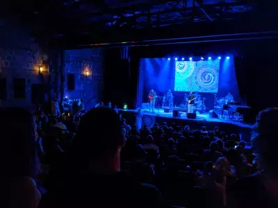Performers on stage at a concert