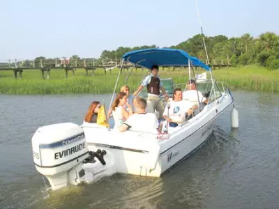 A group of people boating in the ocean